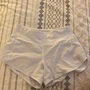 White Lululemon high waisted speed up shorts